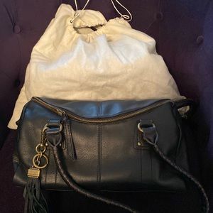 NWOT - Tignanello black purse with beautiful orange/gold lining